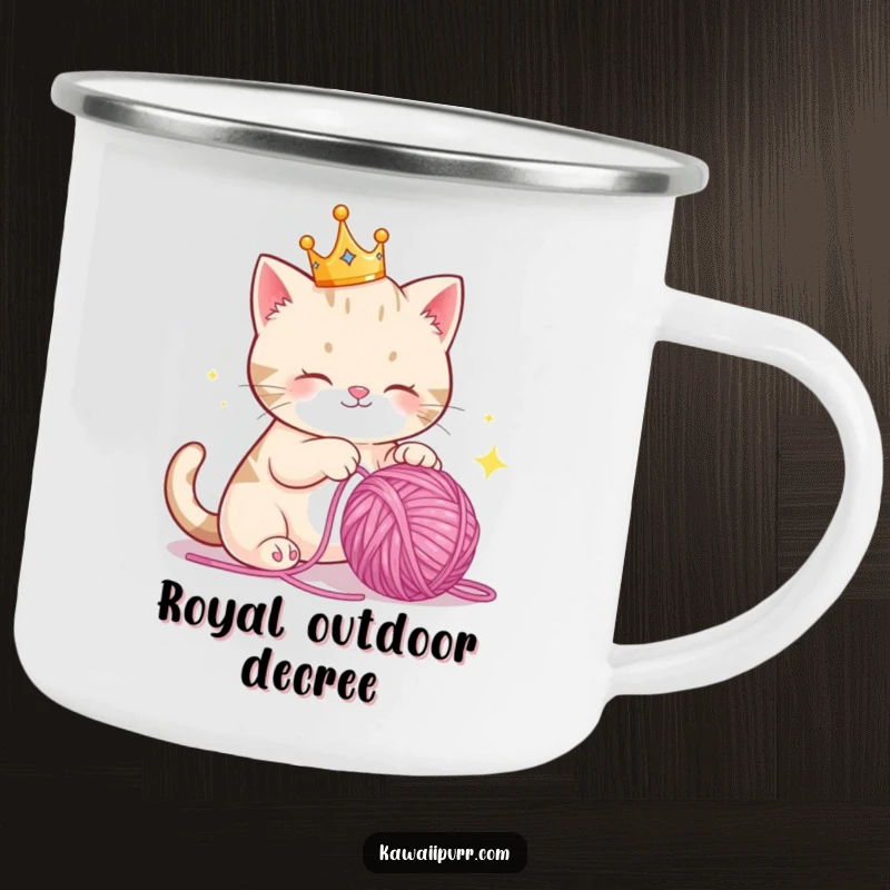 Funny Camping Mug: A cat queen in a crown, gleefully batting a sparkling yarn ball, ready for outdoor adventures.