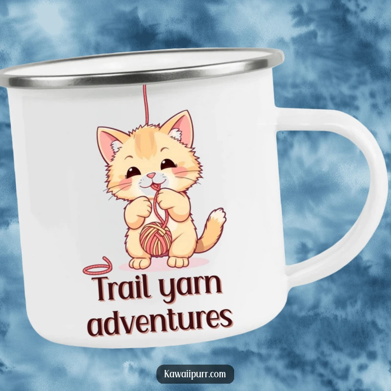 Funny fuzzy cat camping mug, playfully batting at a ball of yarn, sturdy design for outdoor cat enthusiasts.