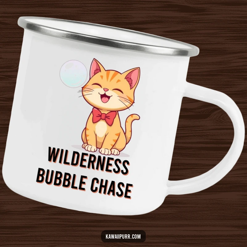 Funny camping mug showing a ginger cat in a bowtie joyfully batting at a floating bubble.