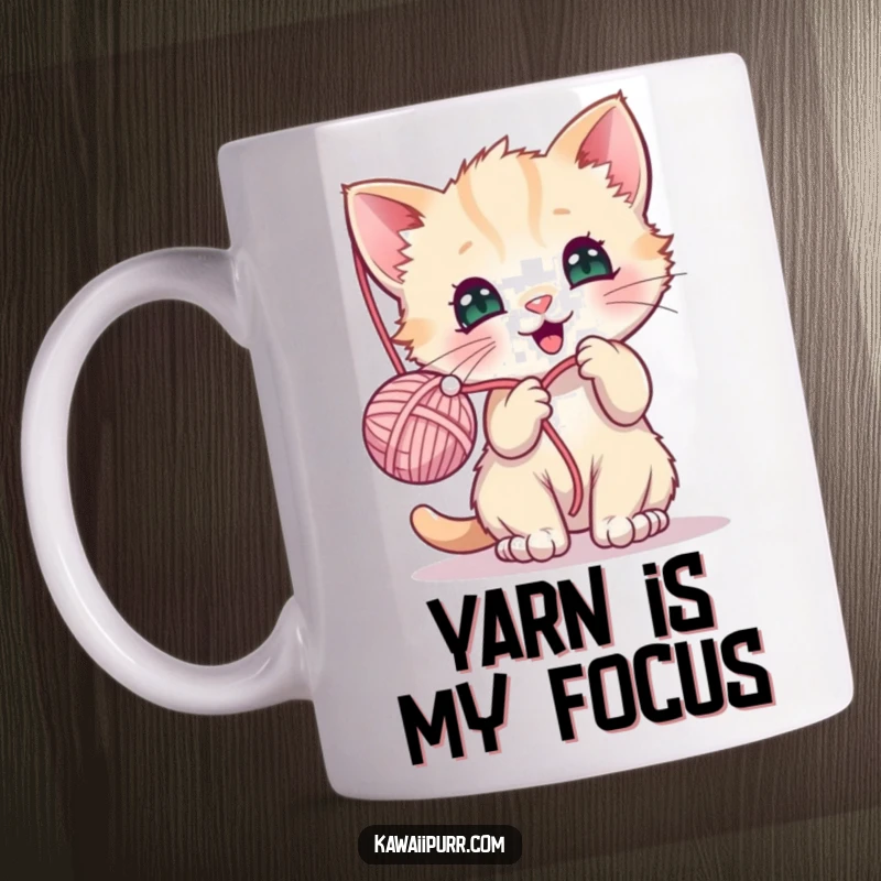 Funny mug showcasing a kawaii kitten character joyfully batting at a dangling ball of yarn, full of playful energy.