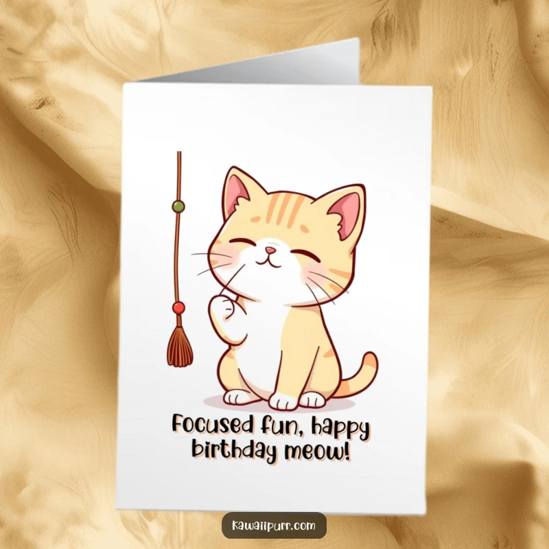 Funny Free Printable Birthday Card: Kawaii cat with intense concentration batting at a dangling string.